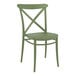 A Siesta olive green resin outdoor dining chair with a cross back.