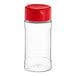 A clear plastic container with a red lid.