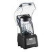 A black Vitamix Quick and Quiet blender on a counter with a clear 40 oz. container.