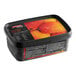 A black plastic container of Andros Chef Sweetened Mango Puree with a black lid.