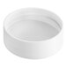 A white round plastic spice container with a white lid.