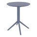 A Siesta Sky round table with a dark grey top and metal base.