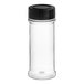 A clear plastic round spice container with a black lid.