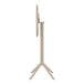 A white stand with a round taupe table top on it.