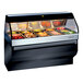 A black Alto-Shaam heated countertop food display case with food in it.