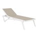 A Siesta Pacific white resin outdoor chaise lounge with a taupe sling on a white background.