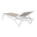 A Siesta Pacific white resin chaise lounge with a taupe sling.