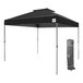 A black E-Z Up canopy tent with a grey frame in a bag with a logo.