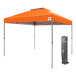 An orange E-Z Up canopy with a grey frame in a bag.