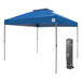 A royal blue E-Z Up canopy with a grey frame in a bag.