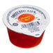 A container of Sweet Baby Ray's Hot Honey Wing Sauce.