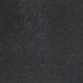 A close-up of a Smoke Gray CleanShield mat with white spots.