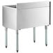 A stainless steel Regency underbar ice bin with legs.