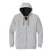 A CornerStone athletic heather grey zip up hoodie with a black hood and zipper.
