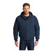 A man wearing a navy CornerStone hooded work jacket.