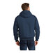 A CornerStone unisex navy work jacket with a hood.