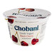 A white Chobani container of Non-Fat Black Cherry Greek Yogurt with a label and a red and black cherry on the lid.