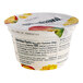 A Chobani Low-Fat Mango Greek Yogurt container with a label.