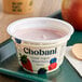 A Chobani Low-Fat Mixed Berry Greek Yogurt cup with a label on it.