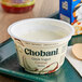 A white bowl of Chobani Low-Fat Coconut Greek Yogurt.