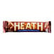 A close up of a HEATH Toffee Bar on a white background.