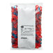 A bag of Albanese mixed gummy berries with red and blue candies.