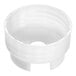 A white plastic object with a hole.