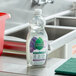 A bottle of Seventh Generation Lavender Flower and Mint dish soap on a counter.