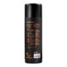 A black and orange cylindrical container with the words "VSSL Nest" on it.