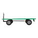 A green and black Valley Craft Quad-Steer trailer with a black and green deck.