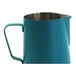 A teal blue stainless steel pitcher with a handle.