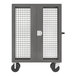 A grey metal Valley Craft security cart with shelves and a cage on wheels.