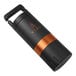 A close-up of a black and orange cylindrical VSSL Java G25 hand coffee grinder.