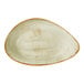 A large, green, oval-shaped freestyle plate with a speckled design and rustic brown rim.