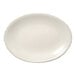 A white oval Libbey porcelain platter with a small rim.