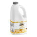 A white plastic jug of Torani Banana Puree Blend with a handle.