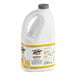 A white jug with a yellow label of Torani Banana Puree Blend.