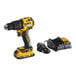 A yellow and black DeWalt 20V MAX cordless hammer drill with a black and yellow battery charger.