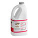 A white Torani jug with a red label and a handle containing 64 fl. oz. of Strawberry Puree Blend.