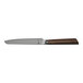 A Reserve by Libbey stainless steel steak knife with a wooden handle.