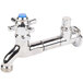 A chrome plated T&S wall-mount hose bib faucet with a blue knob.