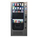A VEND MACH QUICK BREAK combo vending machine with snacks and drinks on the front.