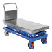 A blue steel Vestil hydraulic elevating cart with a metal platform.