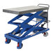 A blue and silver Vestil scissor lift table with wheels.