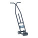 A black steel floor tape applicator with wheels.