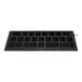 A black rectangular rubber ramp with square holes.