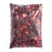 A plastic bag of Simplot Simple Goodness frozen berries with a red and white label.