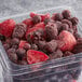 A plastic container of Simplot Simple Goodness frozen berries.