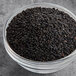 A bowl of Hometown Provisions black sesame seeds.