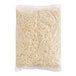 A bag of Cooper Sharp White American Shredded Cheese on a white background.